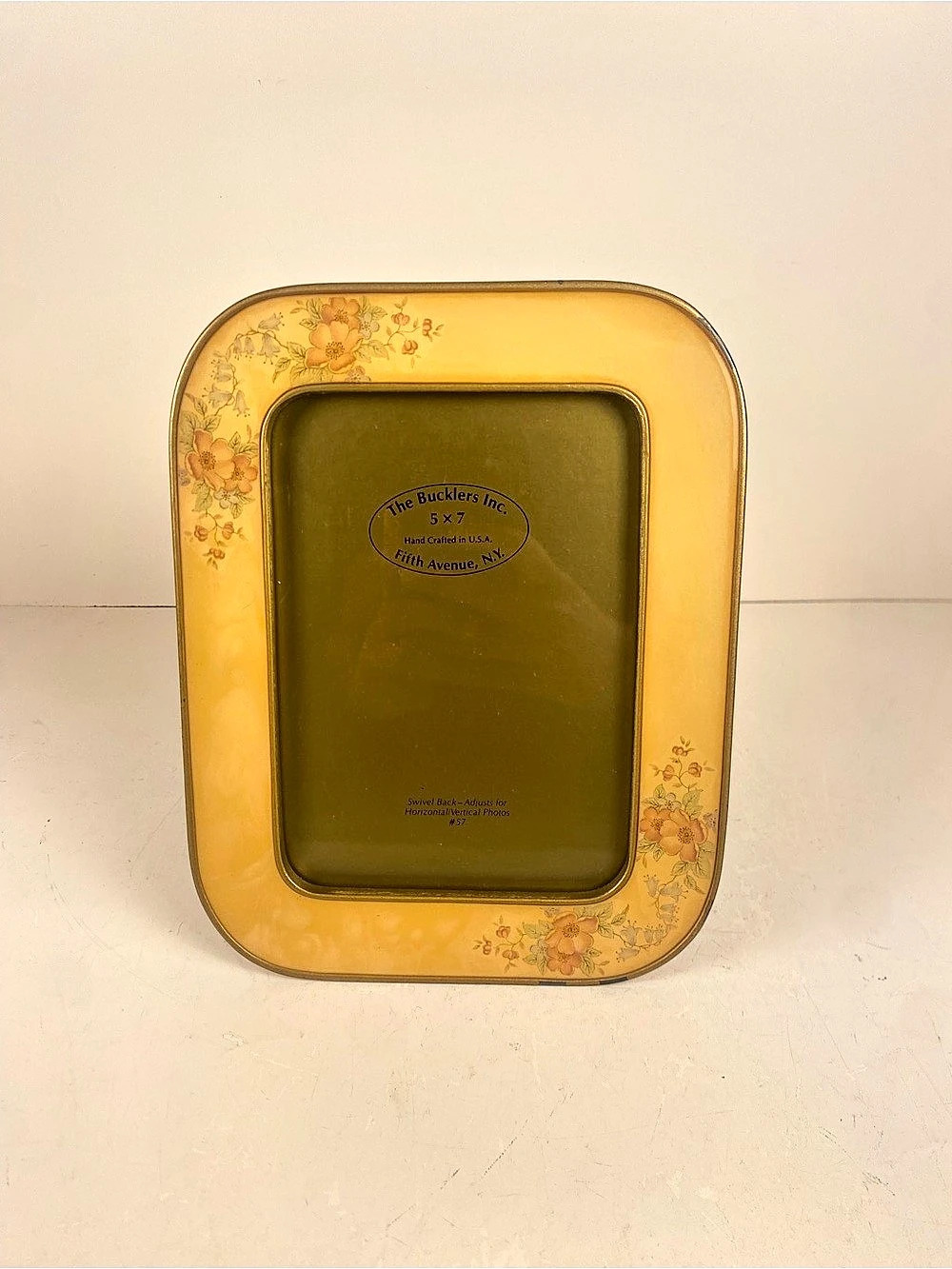 Vintage The Bucklers Inc. Swivel Back #57. Floral 5 x 7 Enamel Over Metal Frame